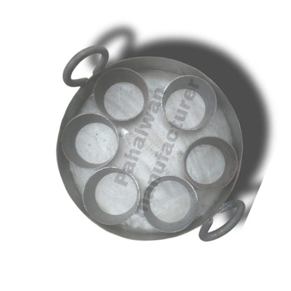 Ghewar Tawi with round moulds