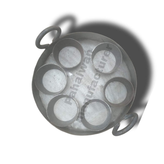 Ghewar Tawi with round moulds