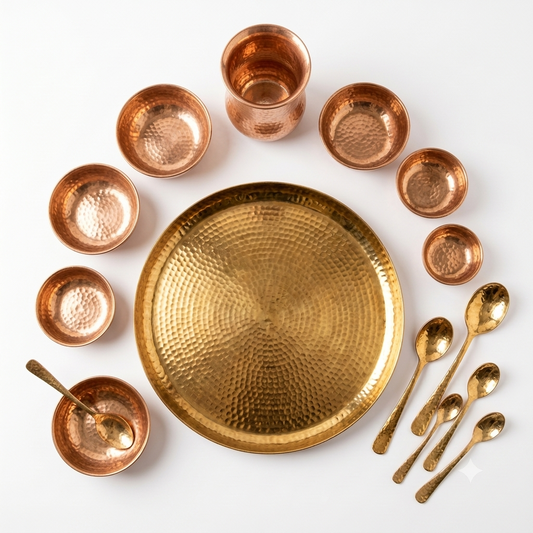 Hammered copper and brass Indian dinnerware with thali bowls glass and spoons