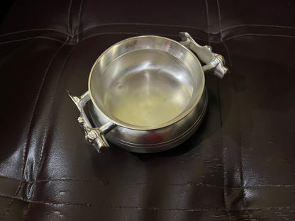 silver coated brass handi bowl showing sculpted tiger motif handles